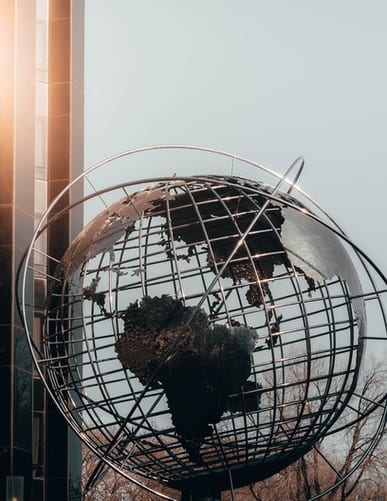 a metal globe depicting a world of corrosion science